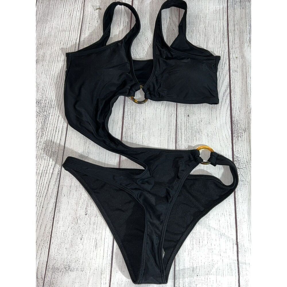 Matte Collection Black One Piece Cutout size medium women’s/juniors